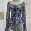 Horn long sleeved T-shirt with irregular ruffle edge and ribbon top