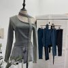 Slanted shoulder ribbon long sleeved short slim fit top