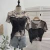 Cowboy patchwork dyed mesh short sleeved t-shirt for women