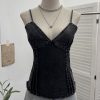 Deep V-neck slim fit sleeveless top with hem