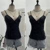 Deep V-neck slim fit sleeveless top with hem