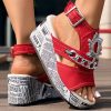 280b513e-40f4-44aa-a284-b0a9a7bc45b8.jpg Newspaper Buckle Denim Wedge Slides - Anklet Not Included